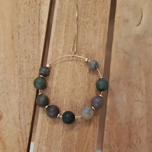 Long  gold necklace and matching earrings